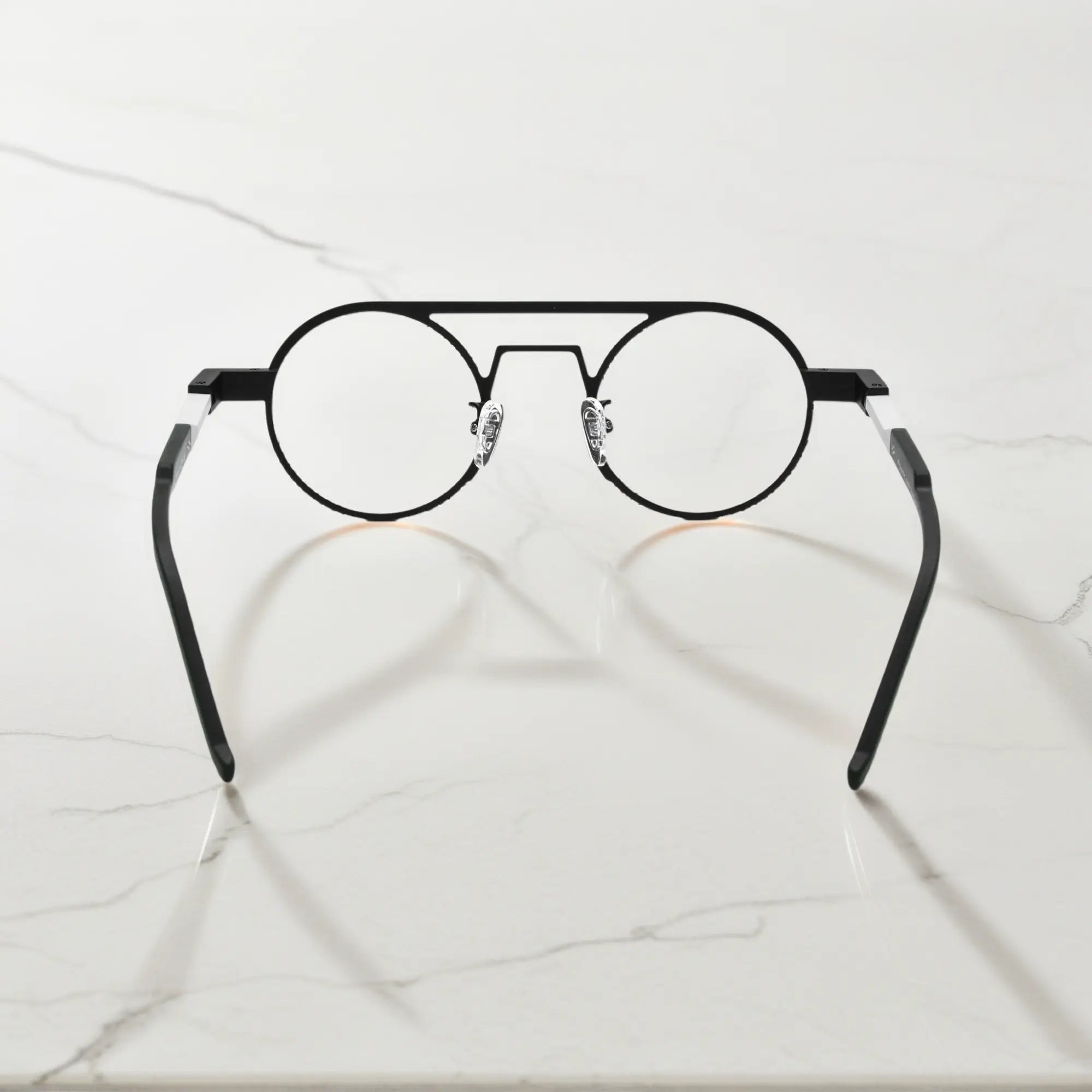 Rear angle displaying the ergonomic nose pads and lightweight design in Graphite Black matte titanium frame for a modern minimalistic look